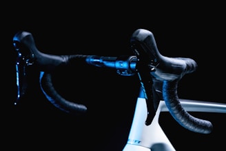 Close-up shot of premium bike accessories displayed on a stylish dark backdrop.