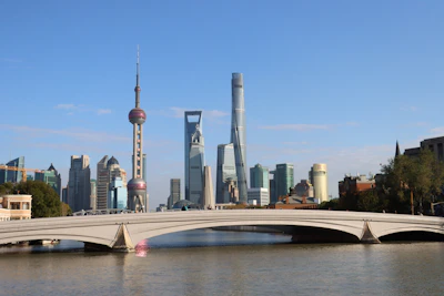 The iconic Sheffield city skyline with the River Don flowing under a clear sky.
