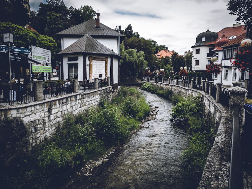 a small river running through a small town