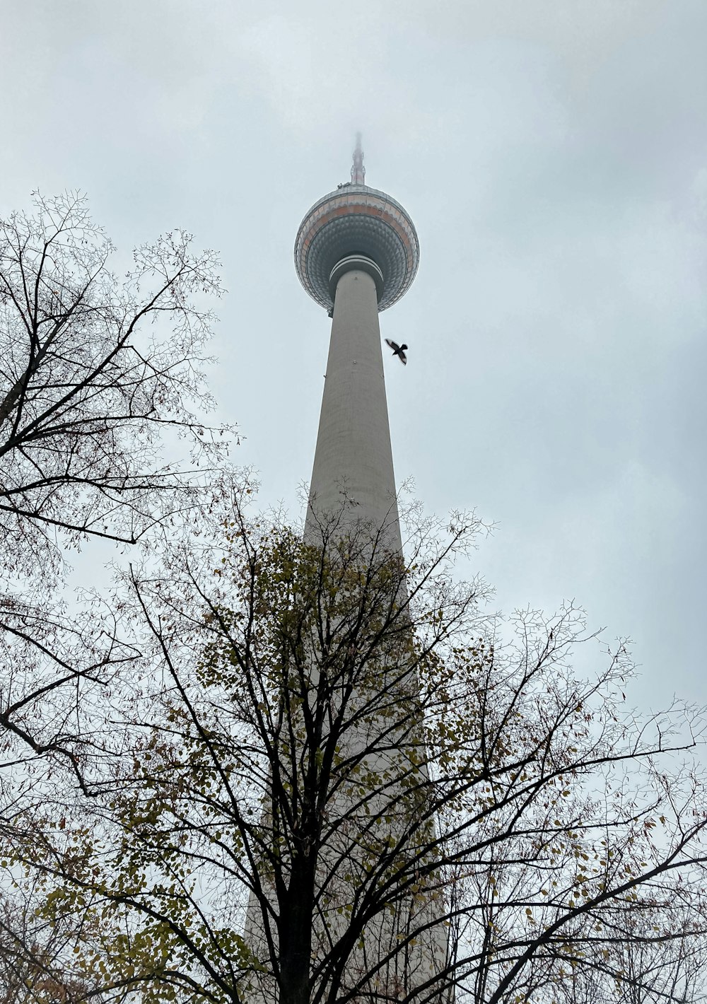 a large tall tower with a sky background