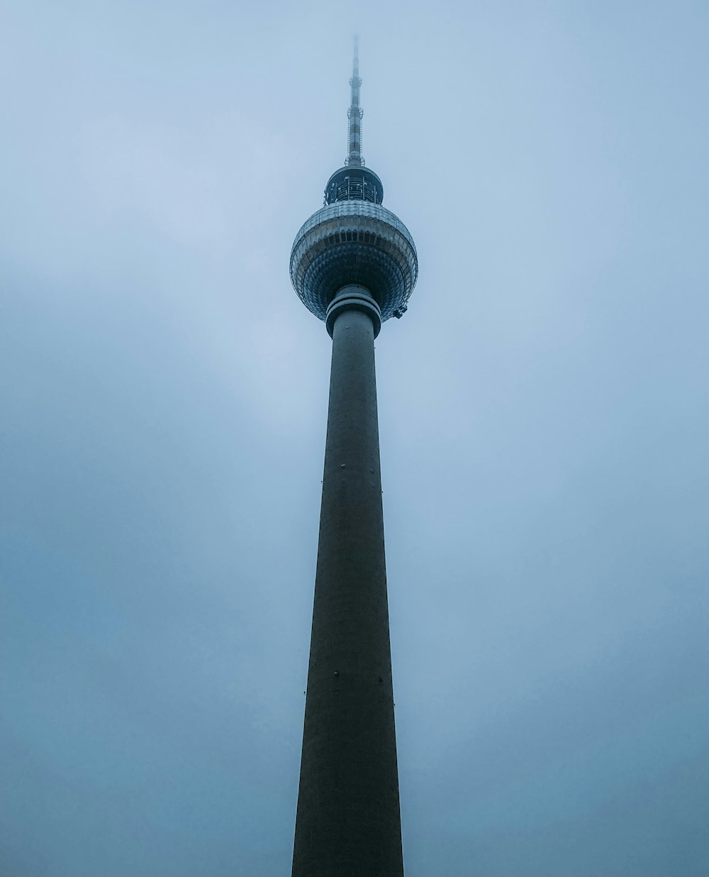 a clock tower on a cloudy day