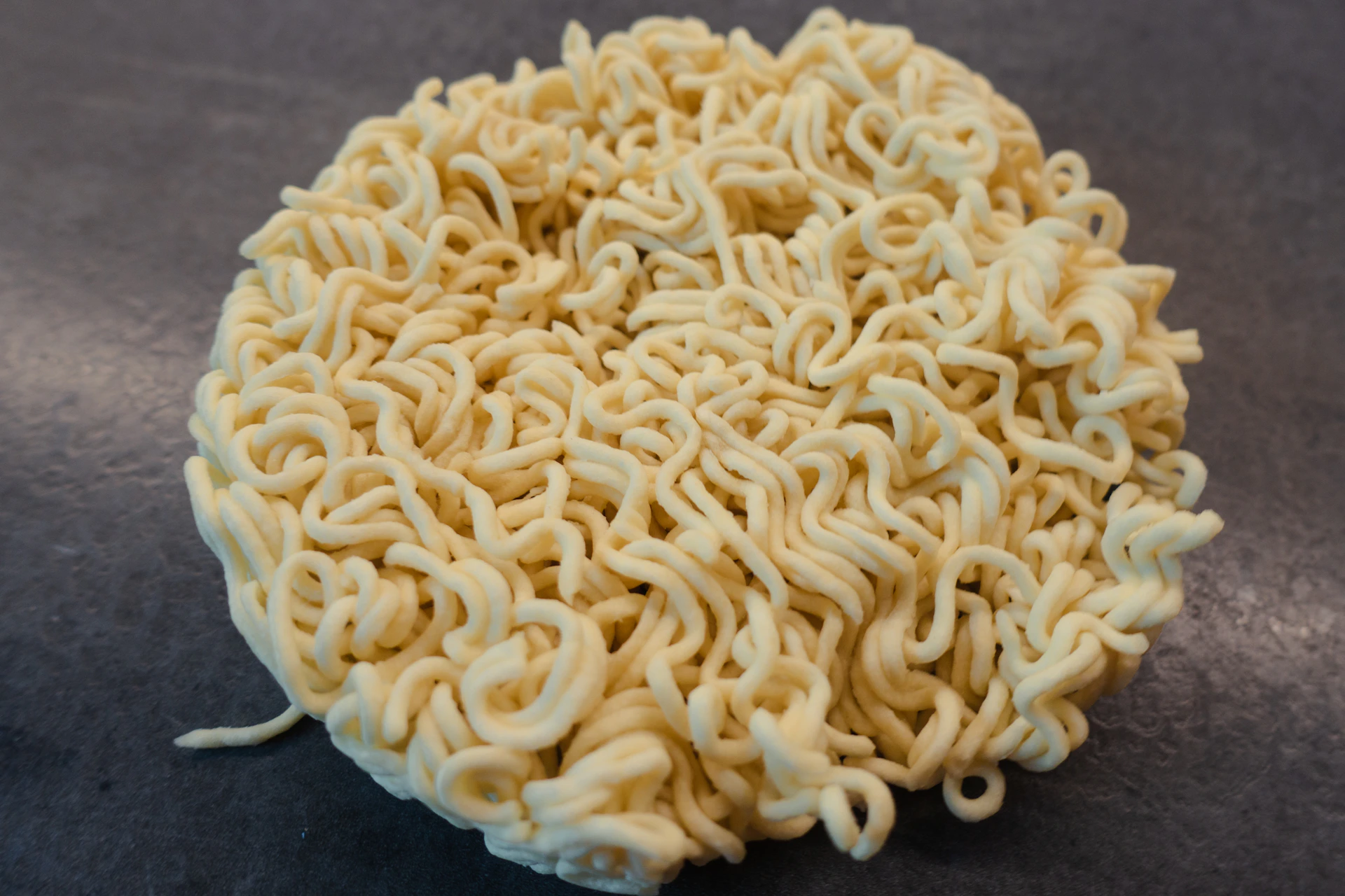 a bowl of ramen noodles on a table