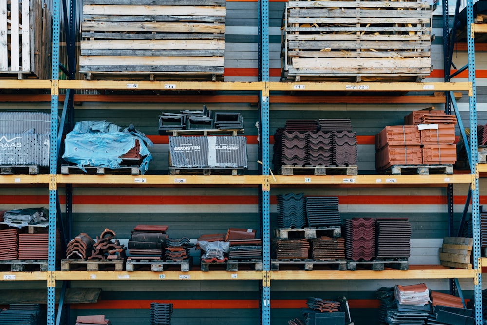 a shelf filled with lots of different types of bricks