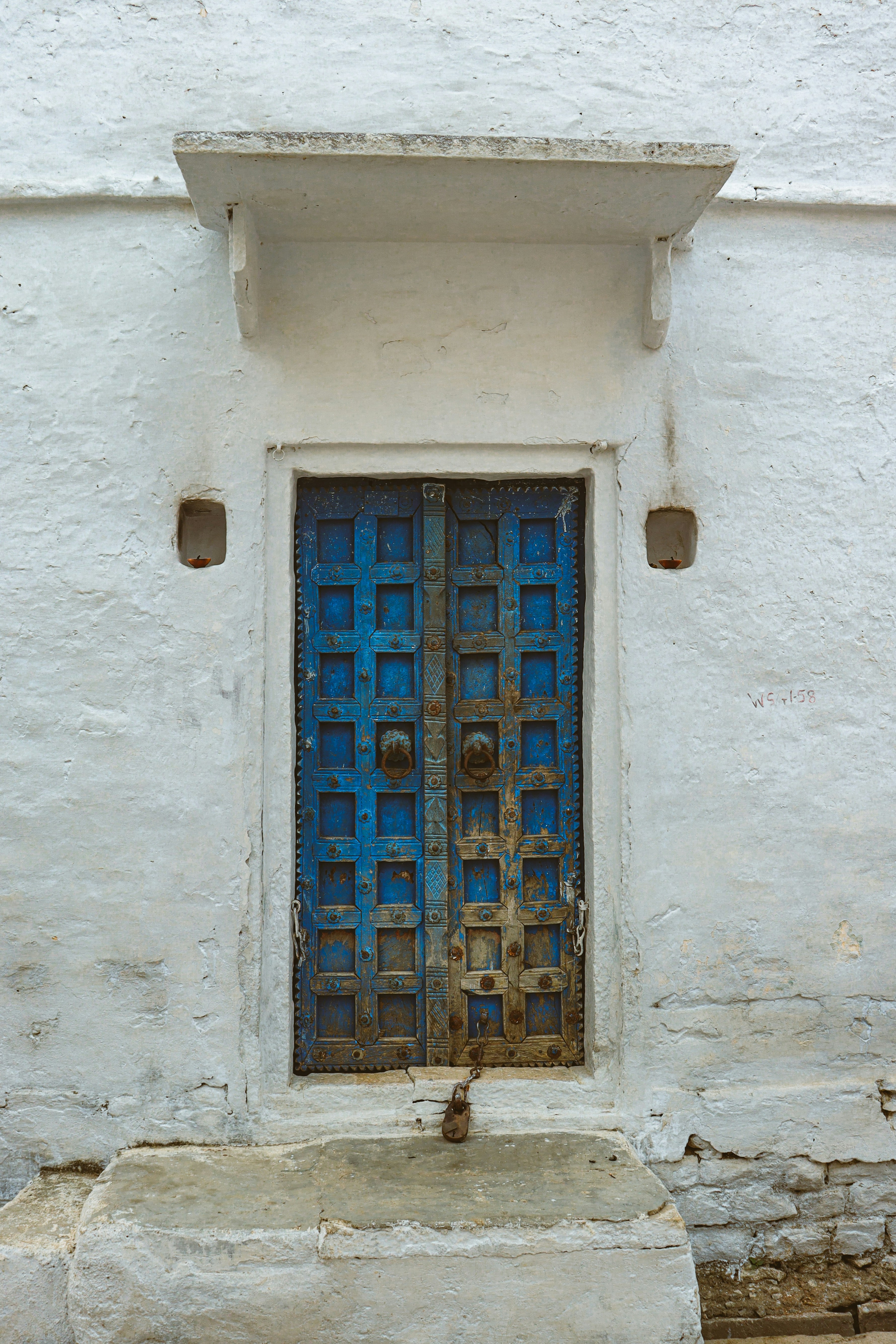 woman wearing yellow long-sleeved dress under white clouds and blue sky during daytime