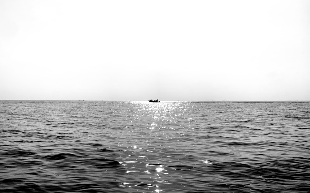 a boat is out in the open water