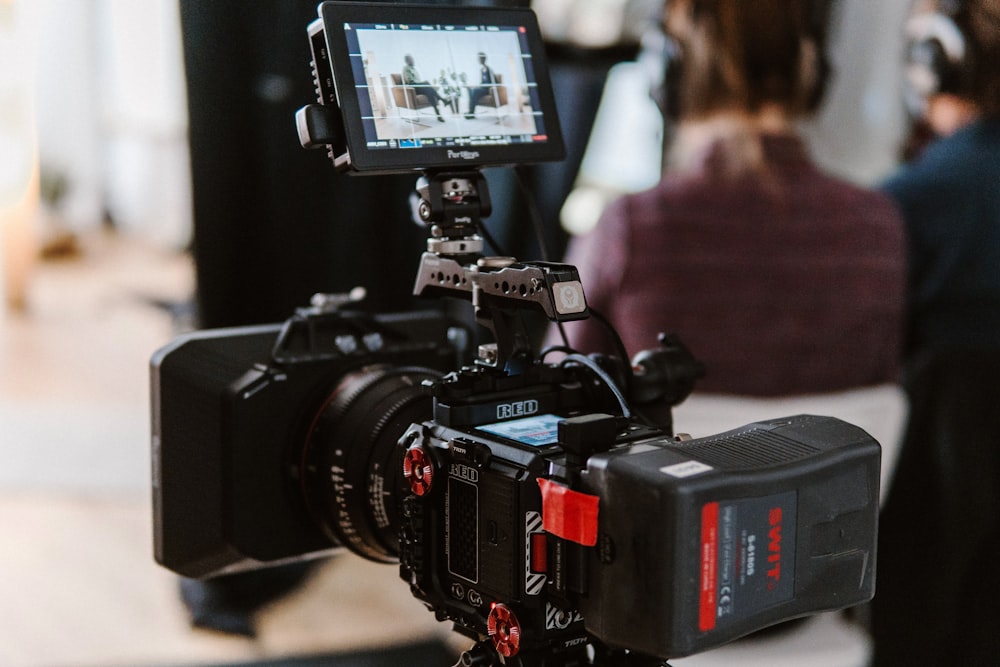 a camera with a video camera attached to it