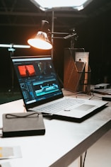 a laptop computer sitting on top of a desk