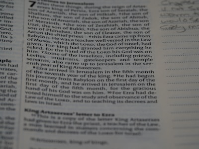 Printed text from a book on a page that contains passages related to biblical scripture, specifically mentioning events and people from the Bible. Some handwritten notes appear on the right margin of the page.