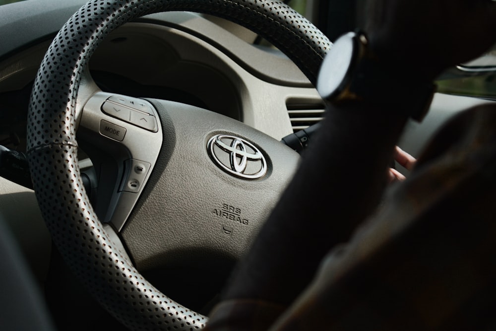 a steering wheel of a car with a steering stick