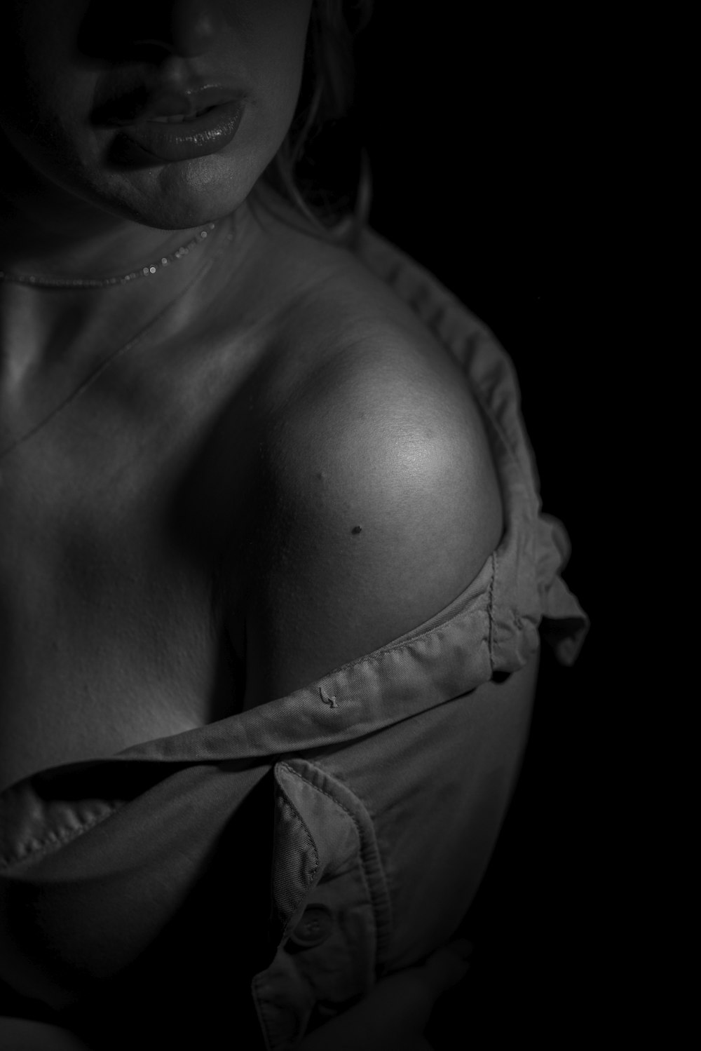 a black and white photo of a woman's breast