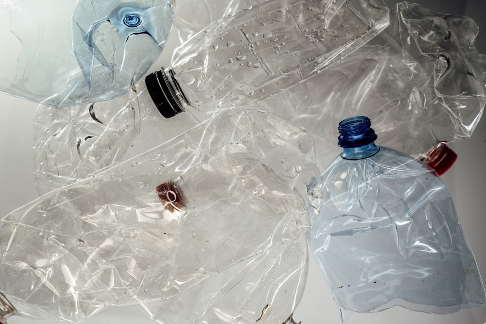 a couple of plastic bottles sitting on top of a table