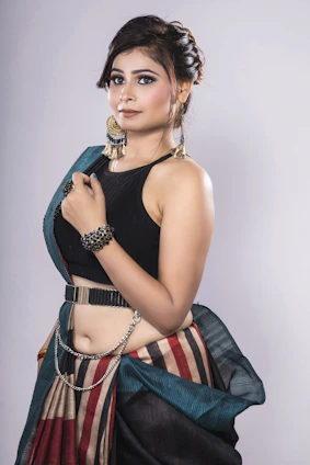 A stylish woman wearing a sleek fashion bracelet with casual attire
