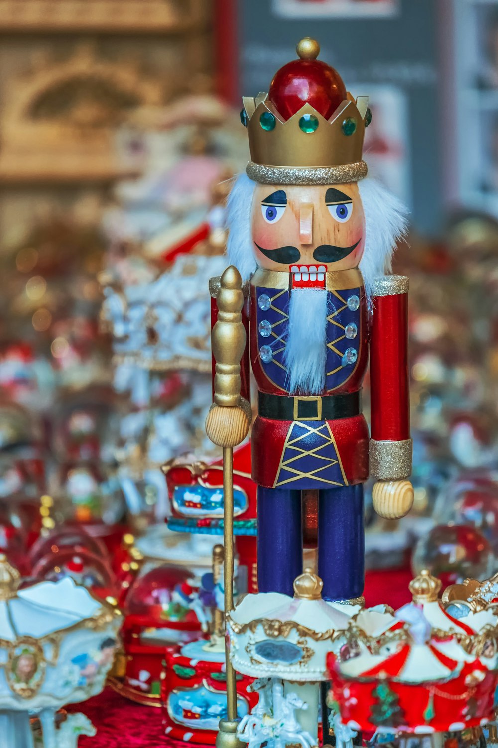 a nutcracker figurine with a crown on top of it
