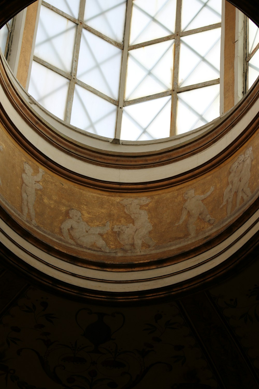 a round window with a skylight above it