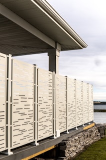 a row of mail boxes sitting on the side of a building