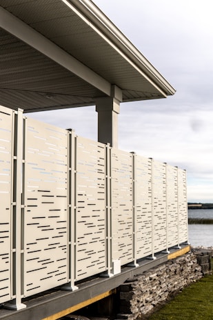 a row of mail boxes sitting on the side of a building