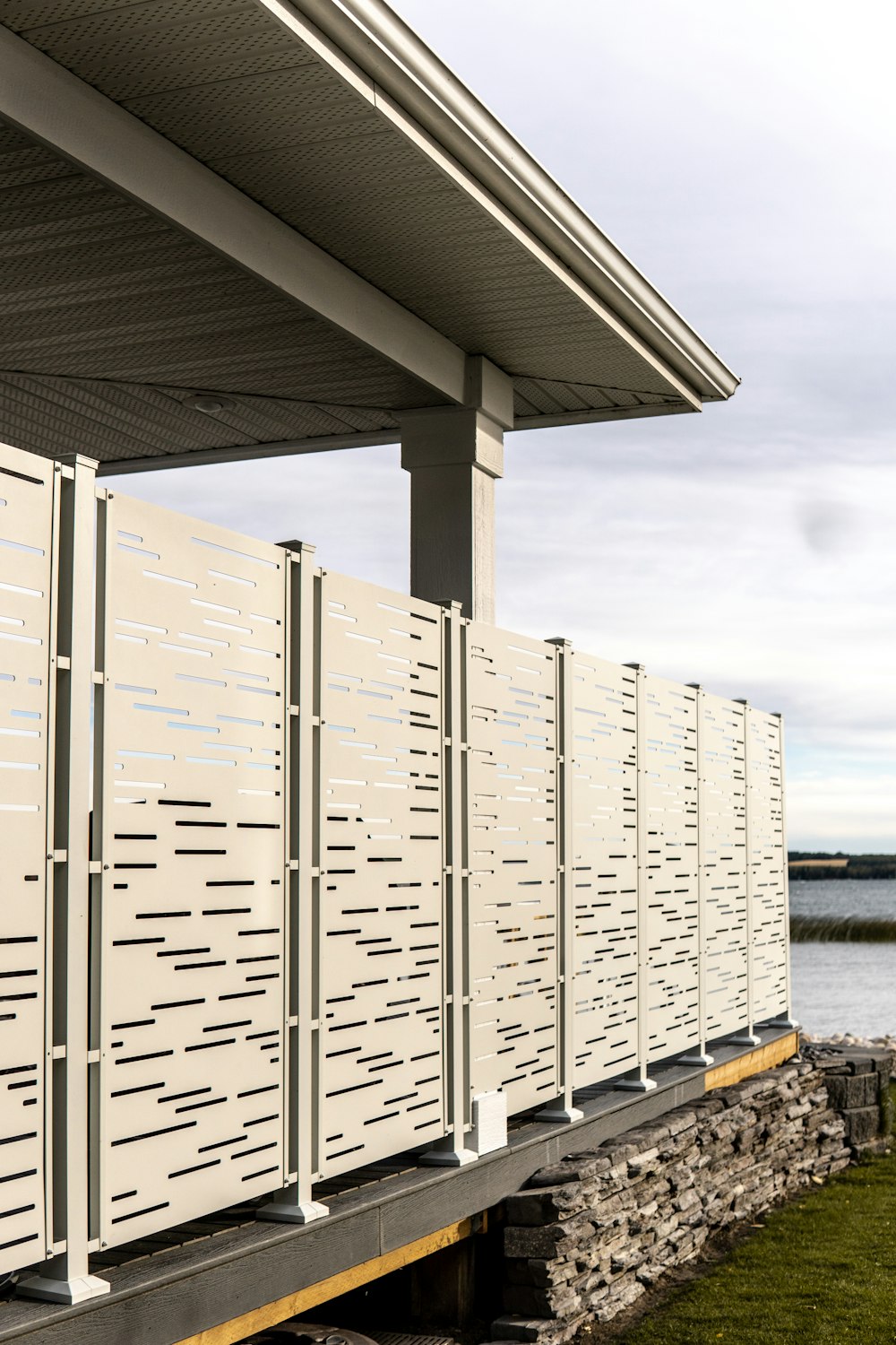 a row of mail boxes sitting on the side of a building