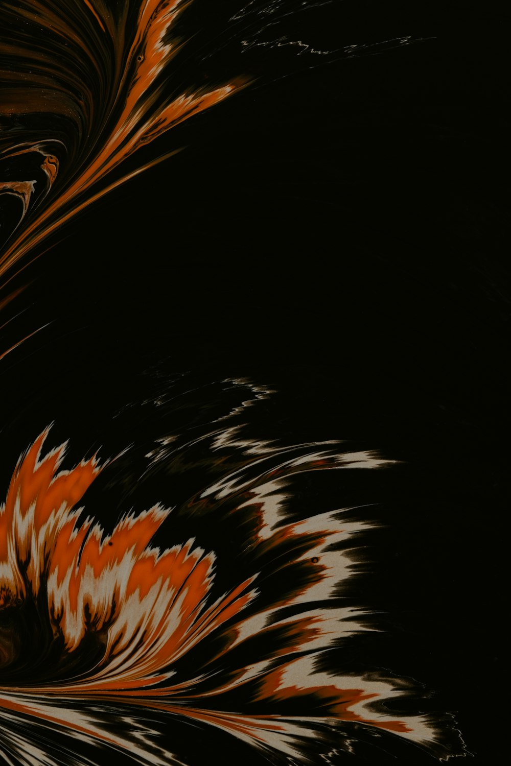a black background with orange and white swirls