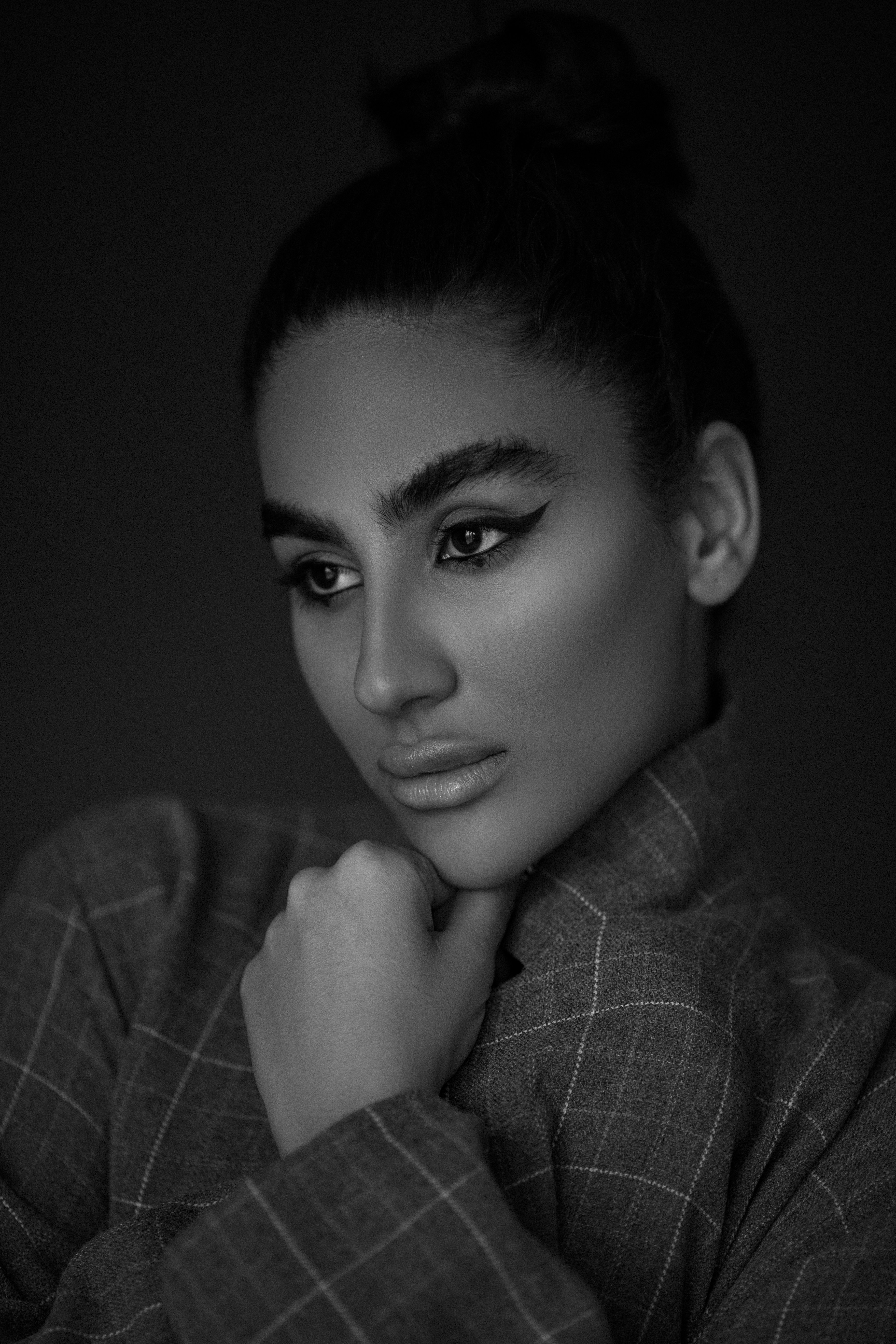 a black and white photo of a woman