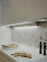 a kitchen counter with a bowl of food on it