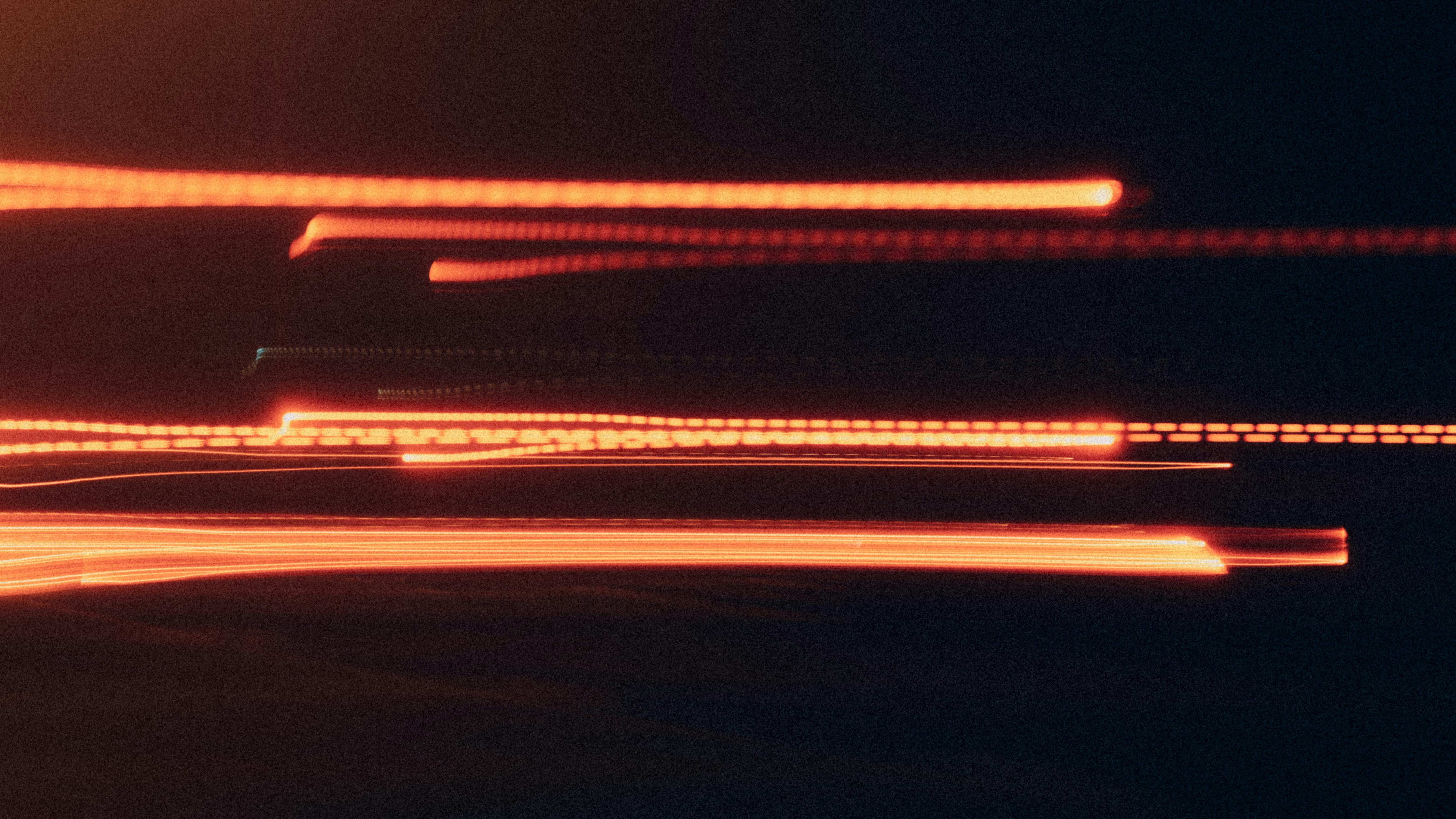 a blurry photo of a street light at night