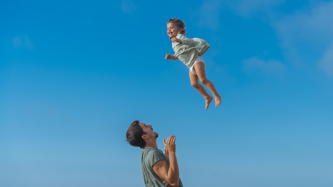 Parent and child playing