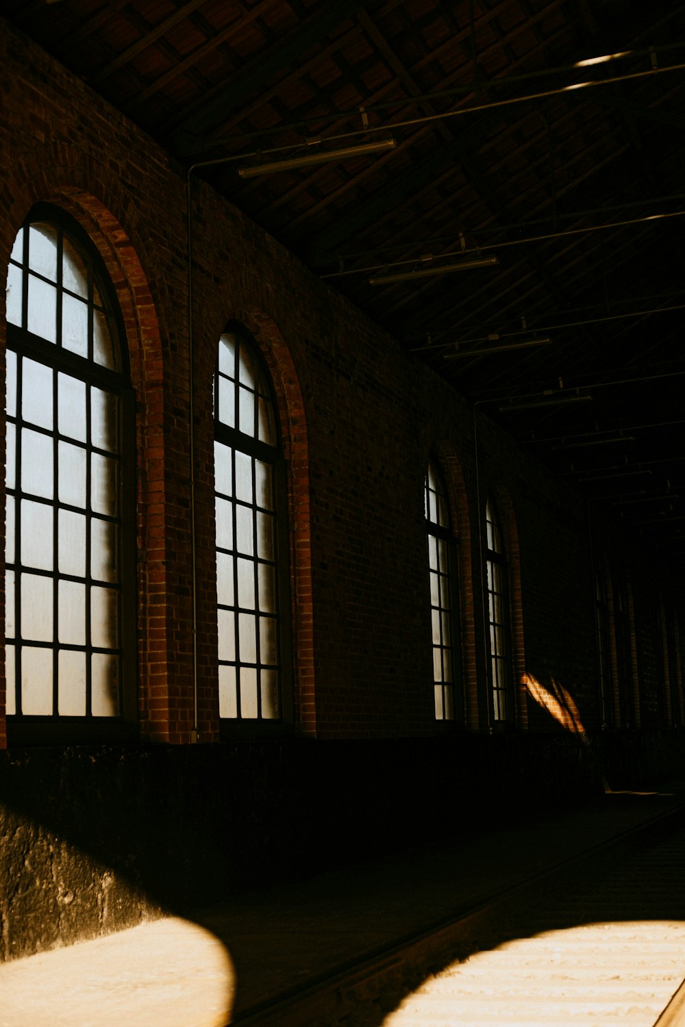 a person riding a skateboard in a large building