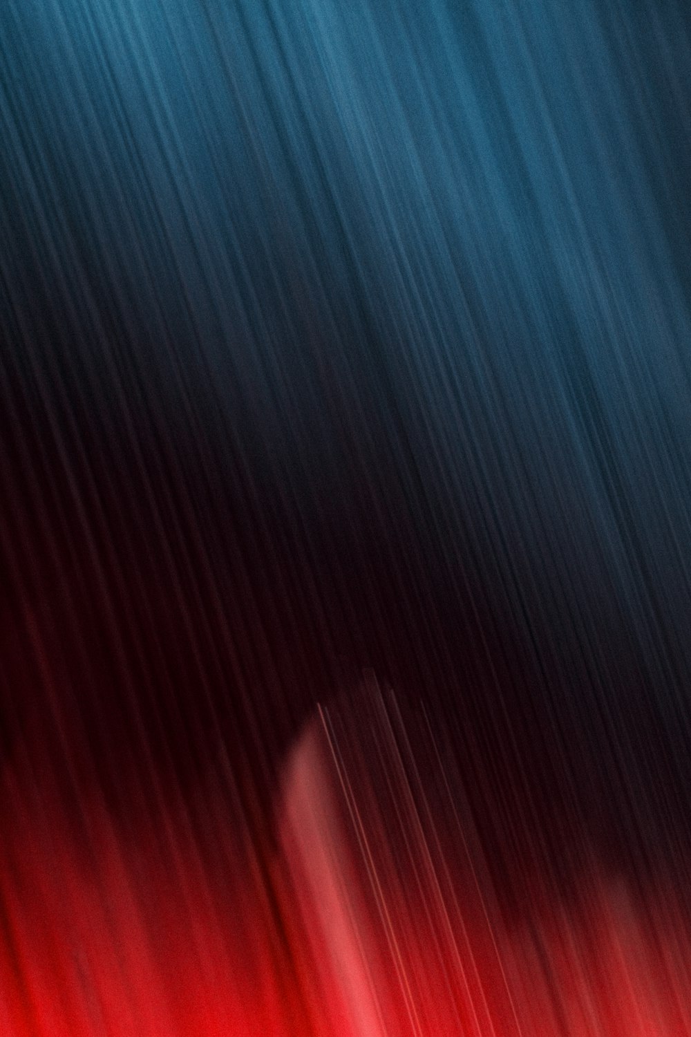 a red and blue background with a black background