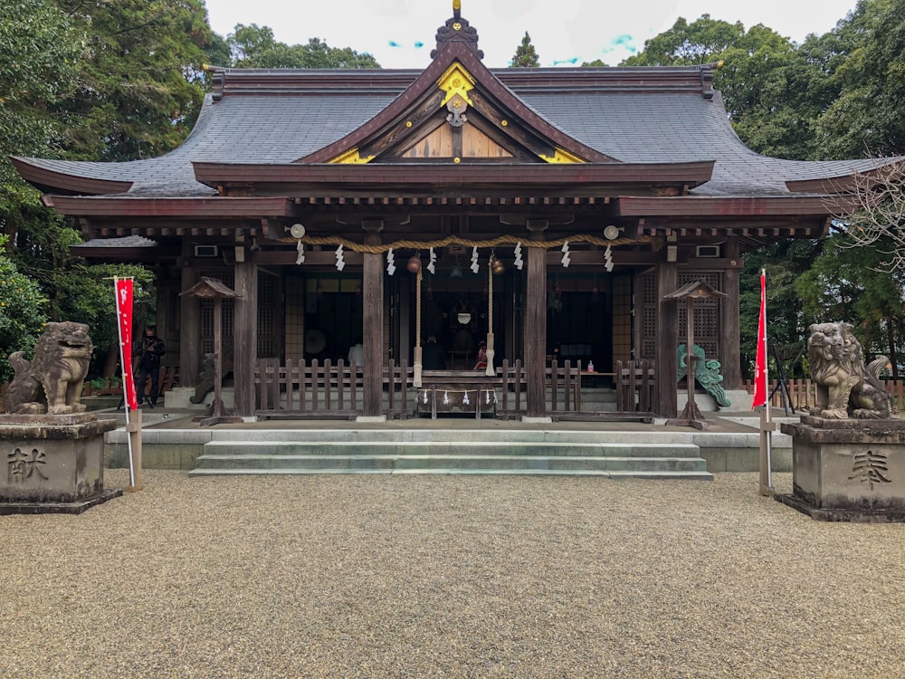 a building with statues in front of it