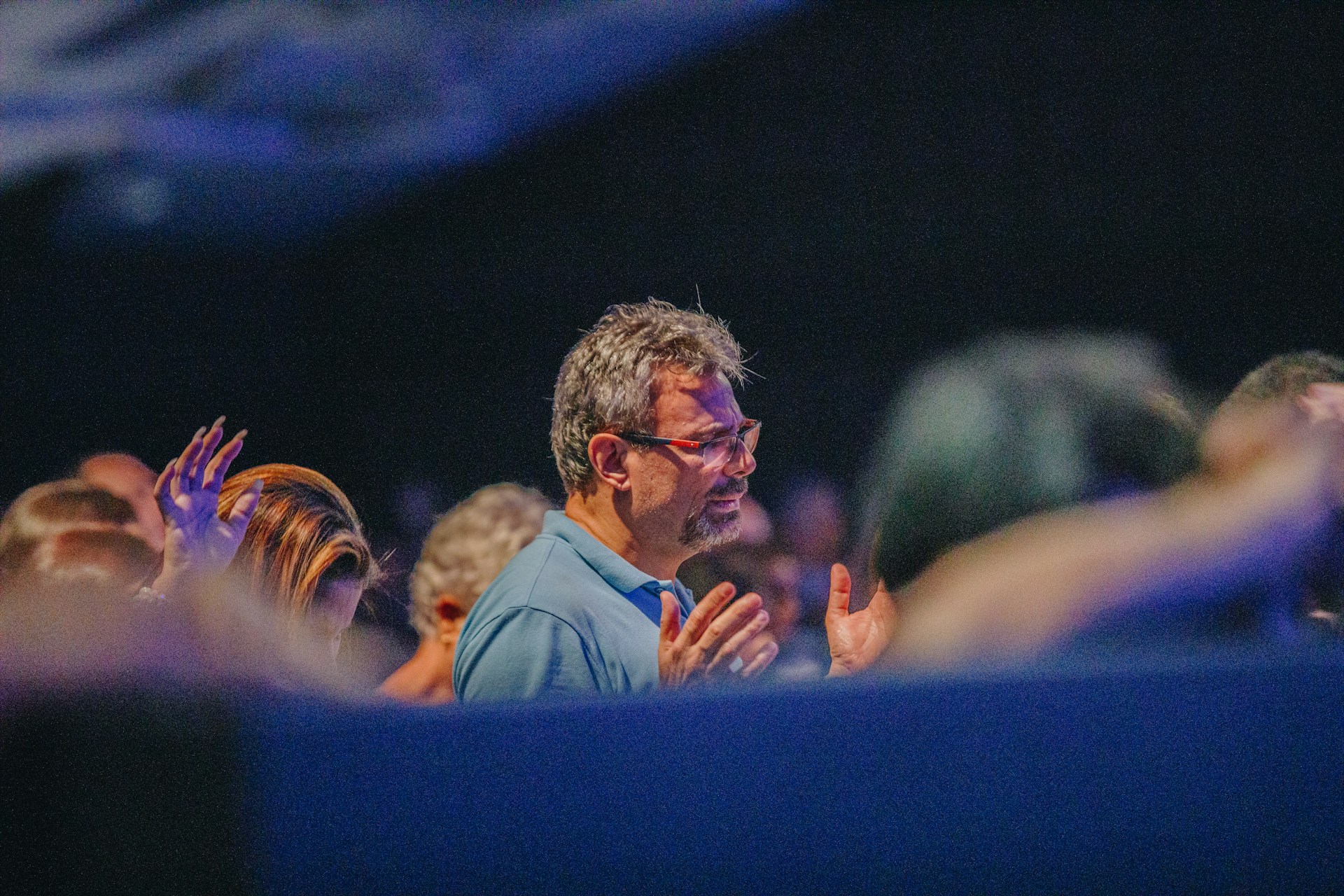 a man standing in front of a crowd of people