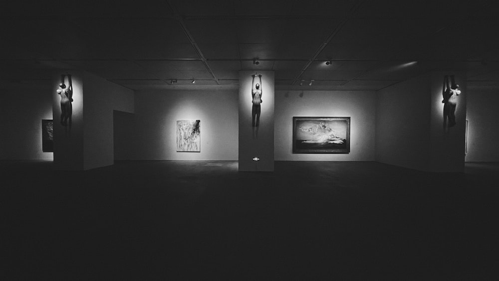 a black and white photo of a dimly lit room