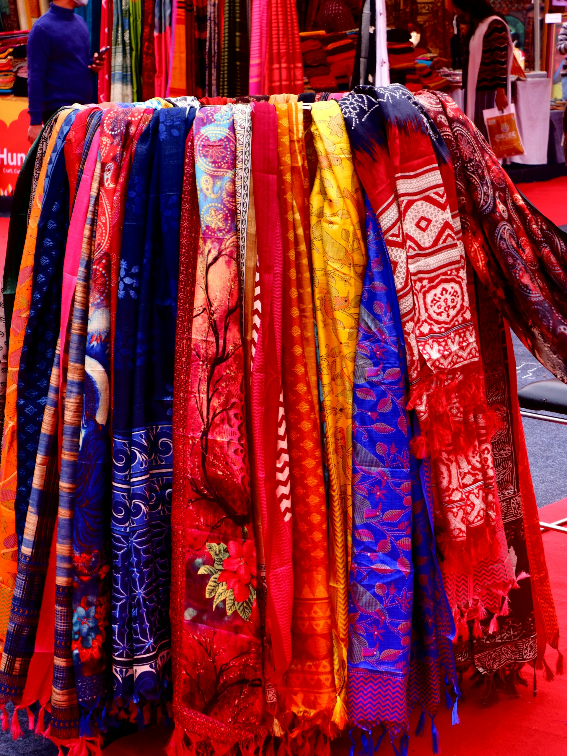 person wearing grey knit sweater