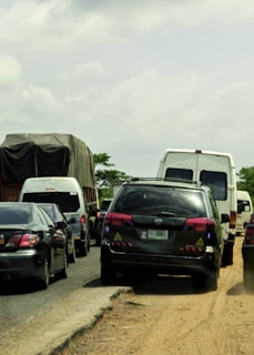A group of vehicles on the road, showcasing fleet management in action.