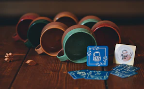 A set of handcrafted ceramic mugs, freshly sold and packed for delivery.