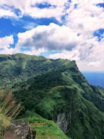 A scenic mountain landscape with lush greenery.