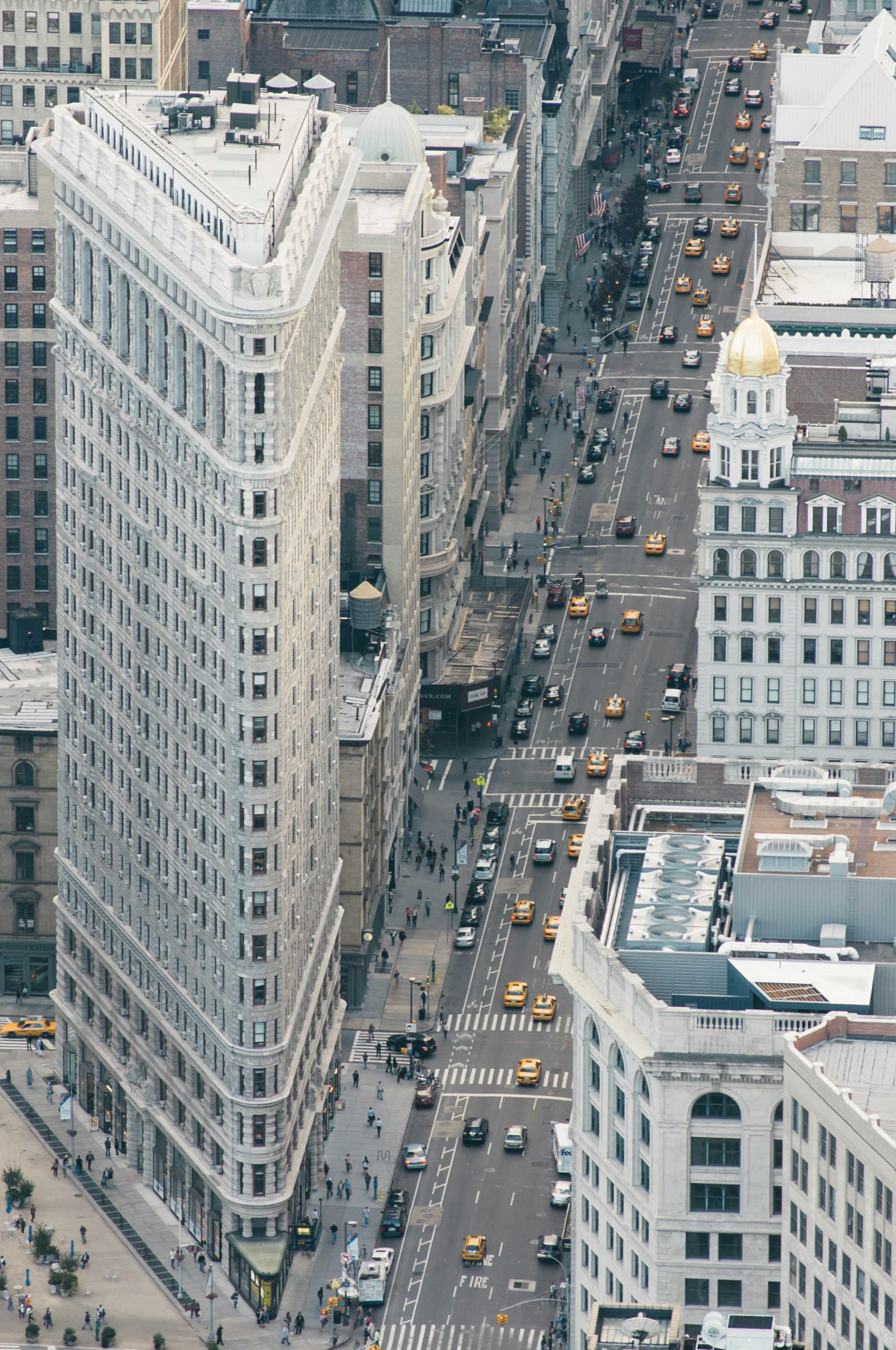 An aerial view of a city with tall buildings photo – Free Road Image on ...