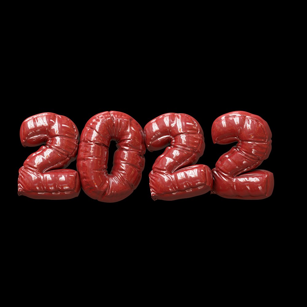 a number of red balloons spelling out the word 2012