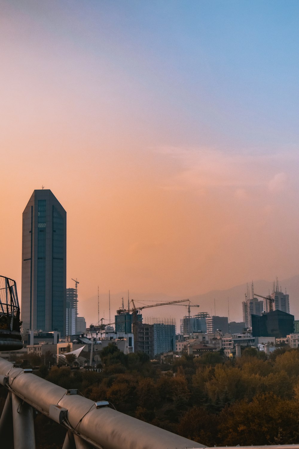 a view of a city from a bridge