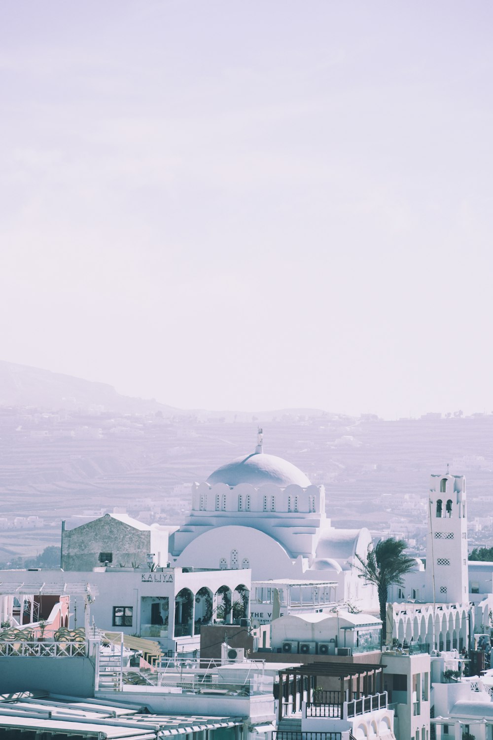 a large white building with a dome on top of it