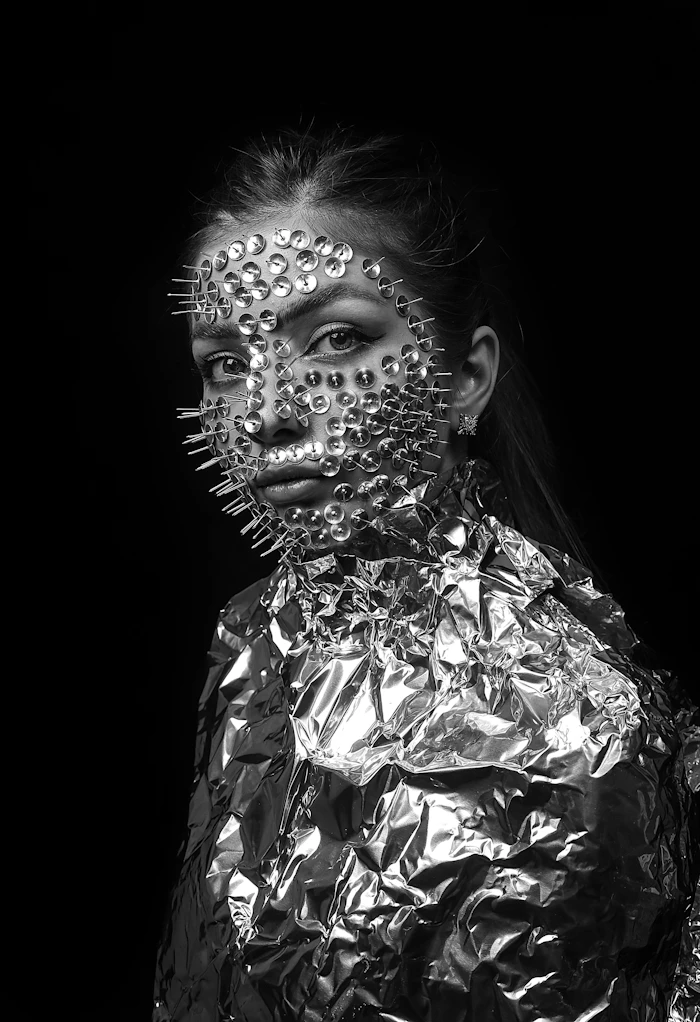 metallic foil face — Unsplash