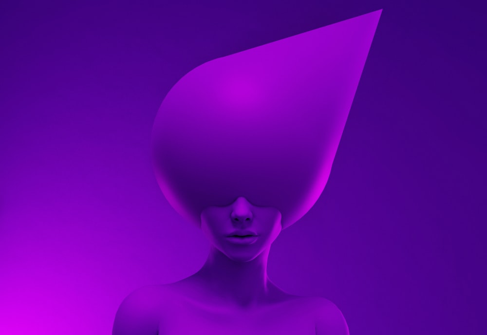 a woman's head is shown with a purple background