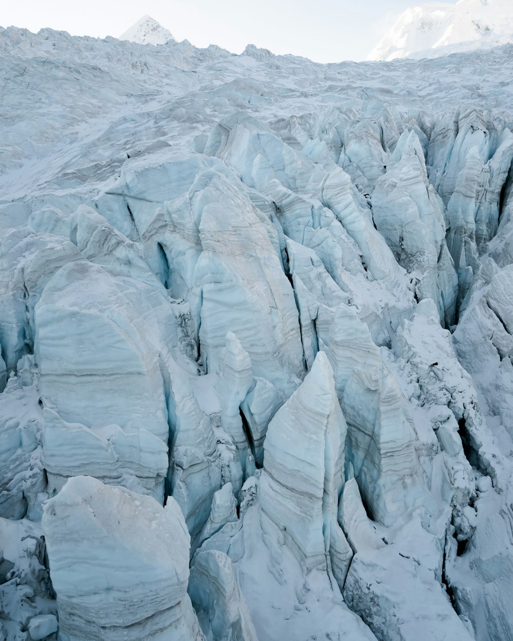 a large group of rocks covered in snow