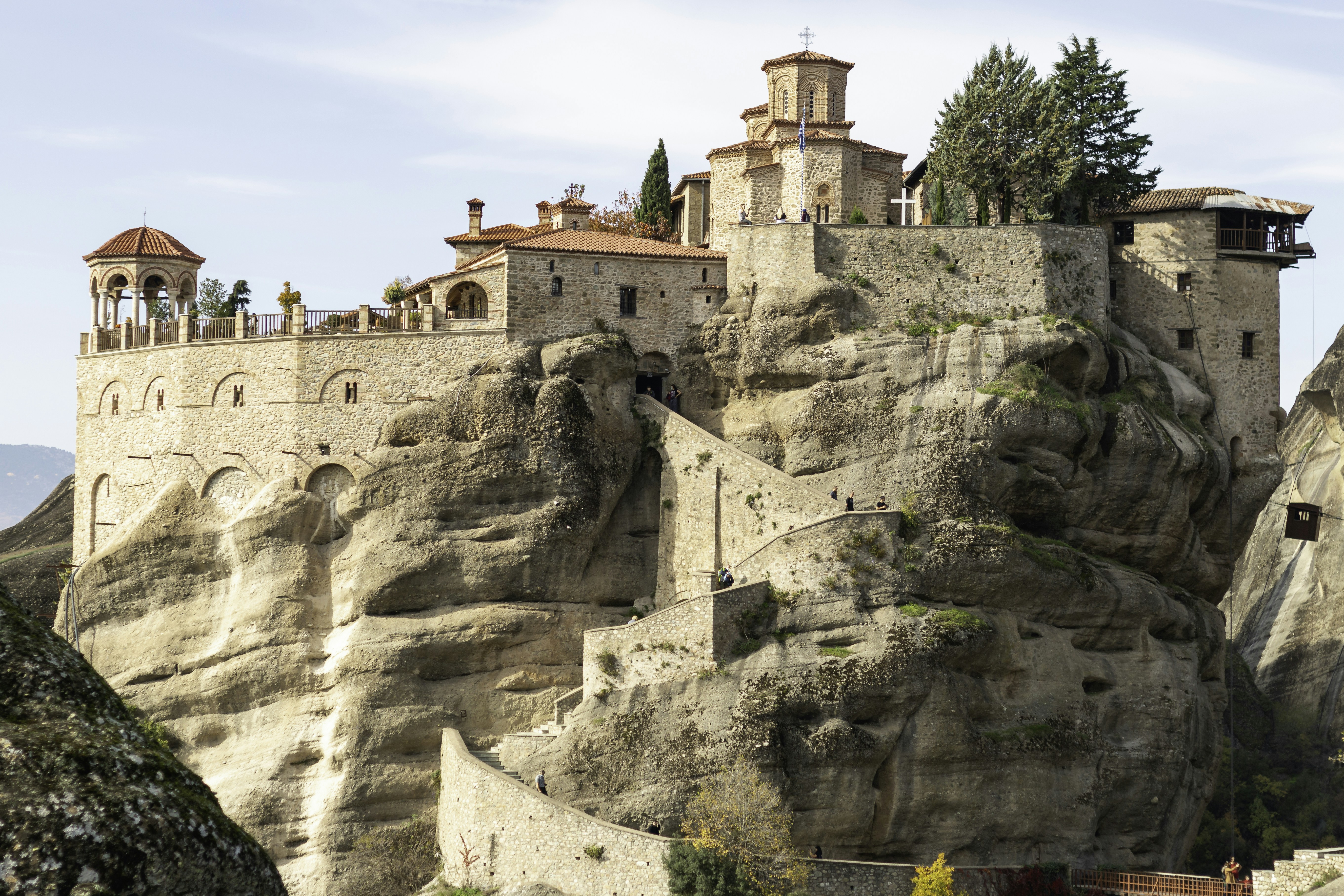 a castle perched on top of a rocky cliff