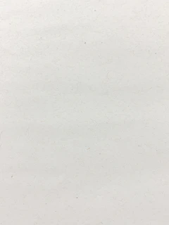 a black and white photo of a person on a surfboard