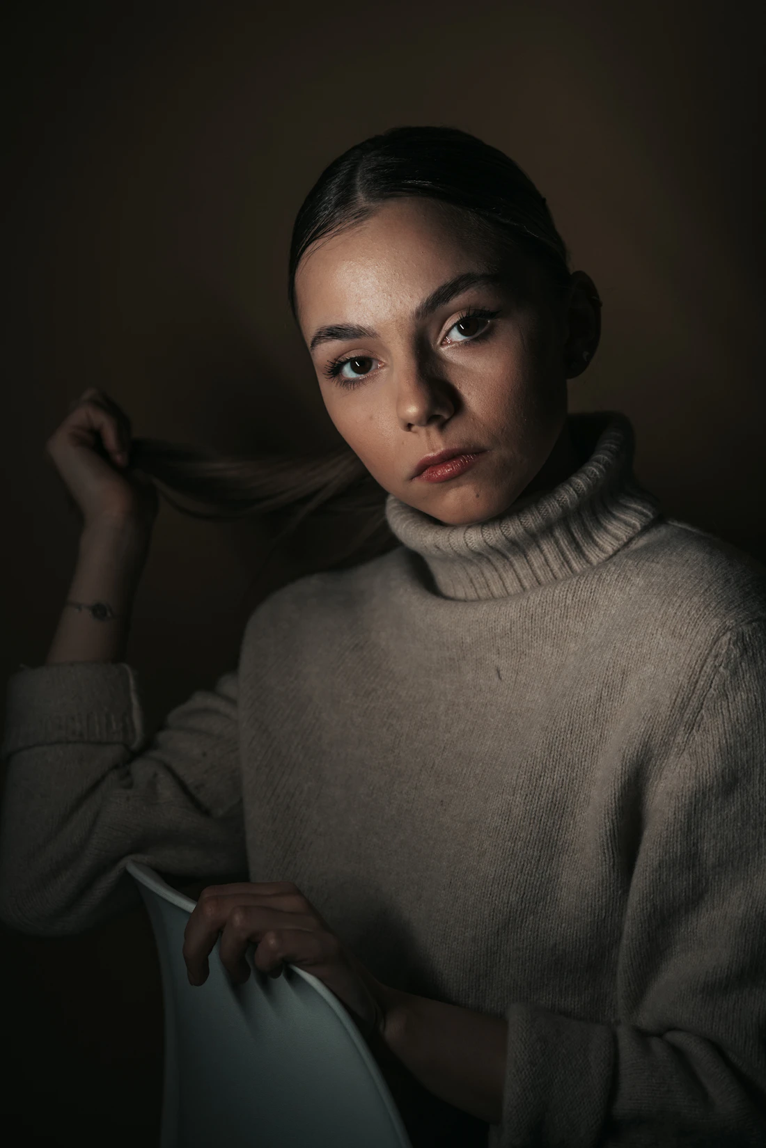 Portret u vunenom džemperu