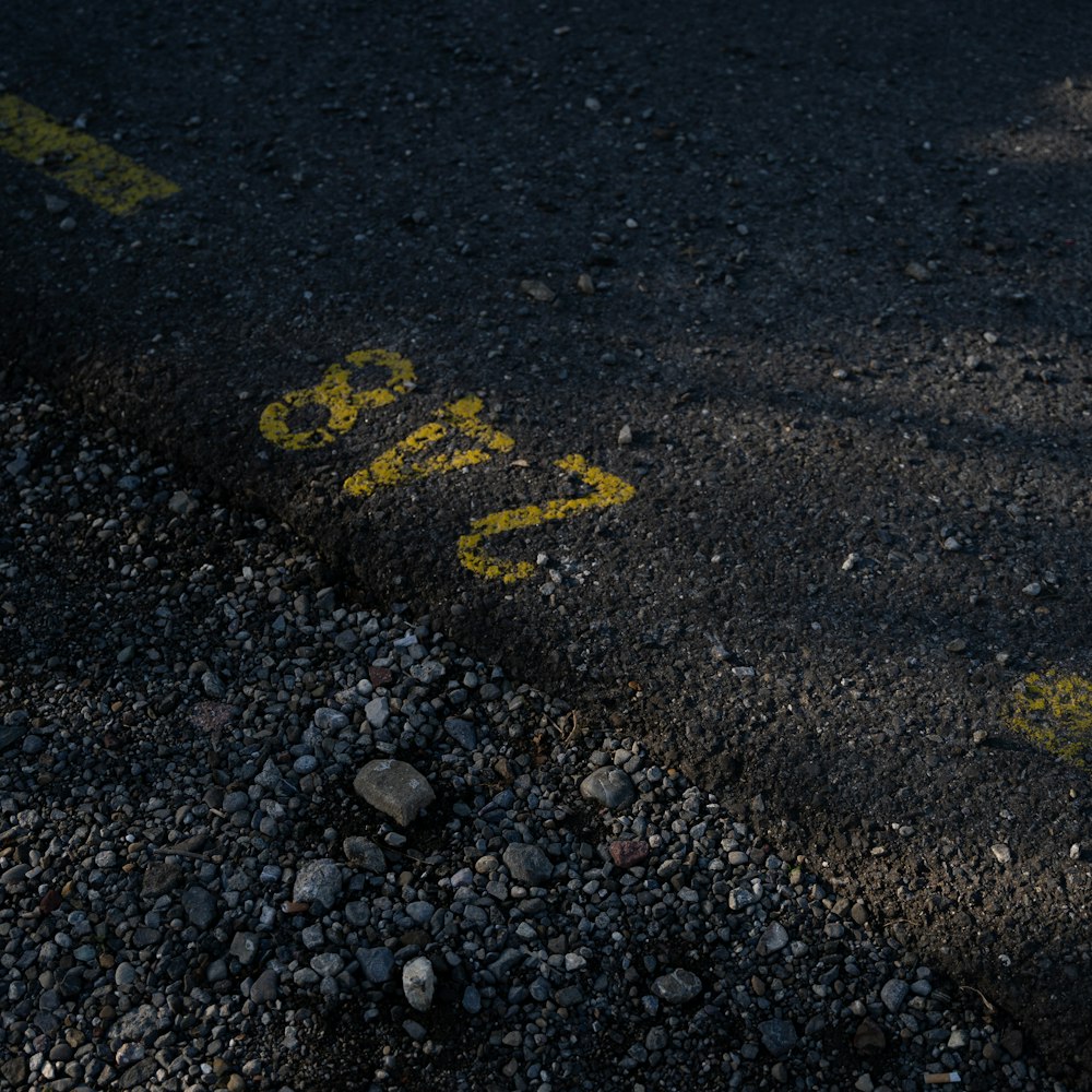 a stop sign that is on the side of the road