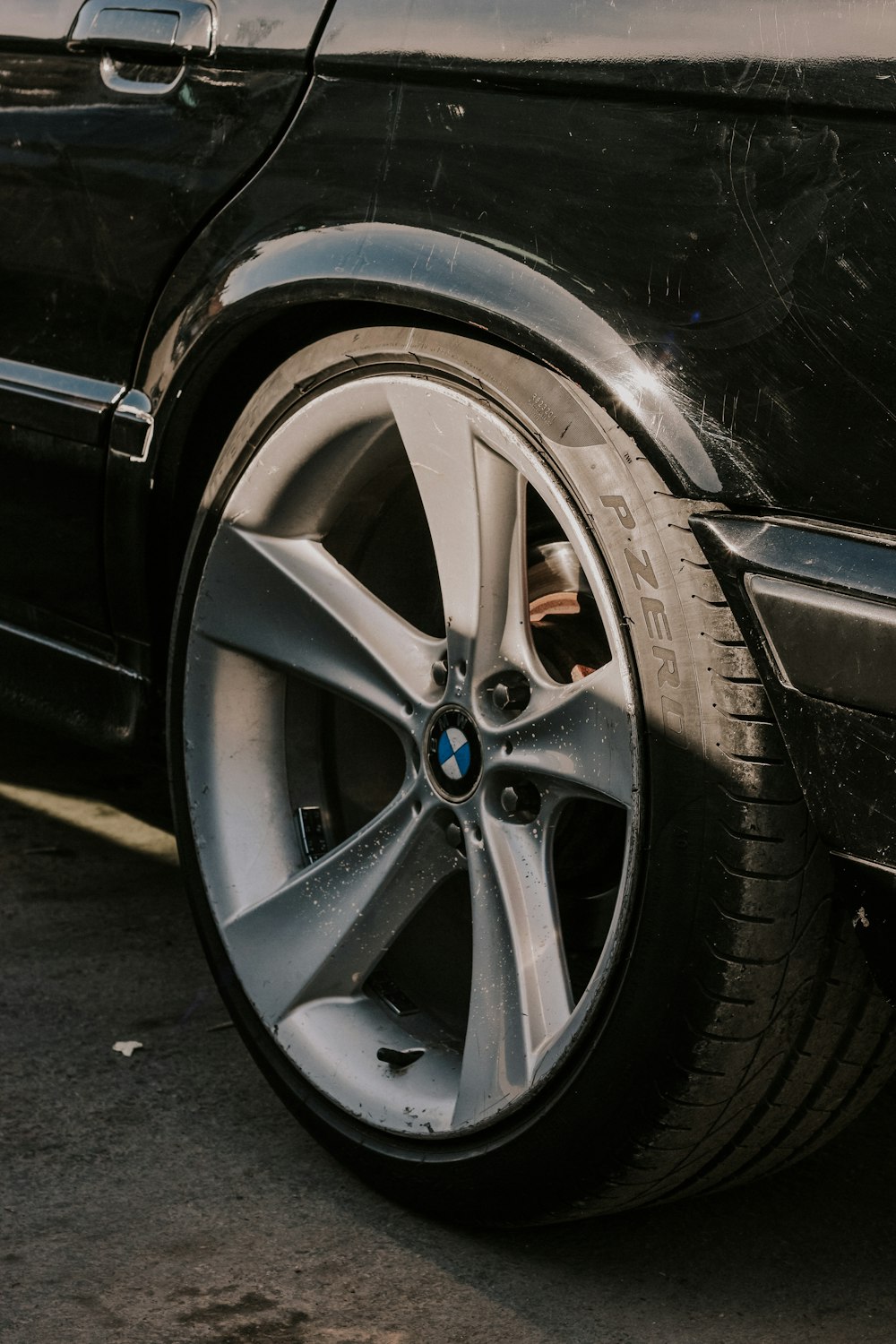 a close up of a tire on a car