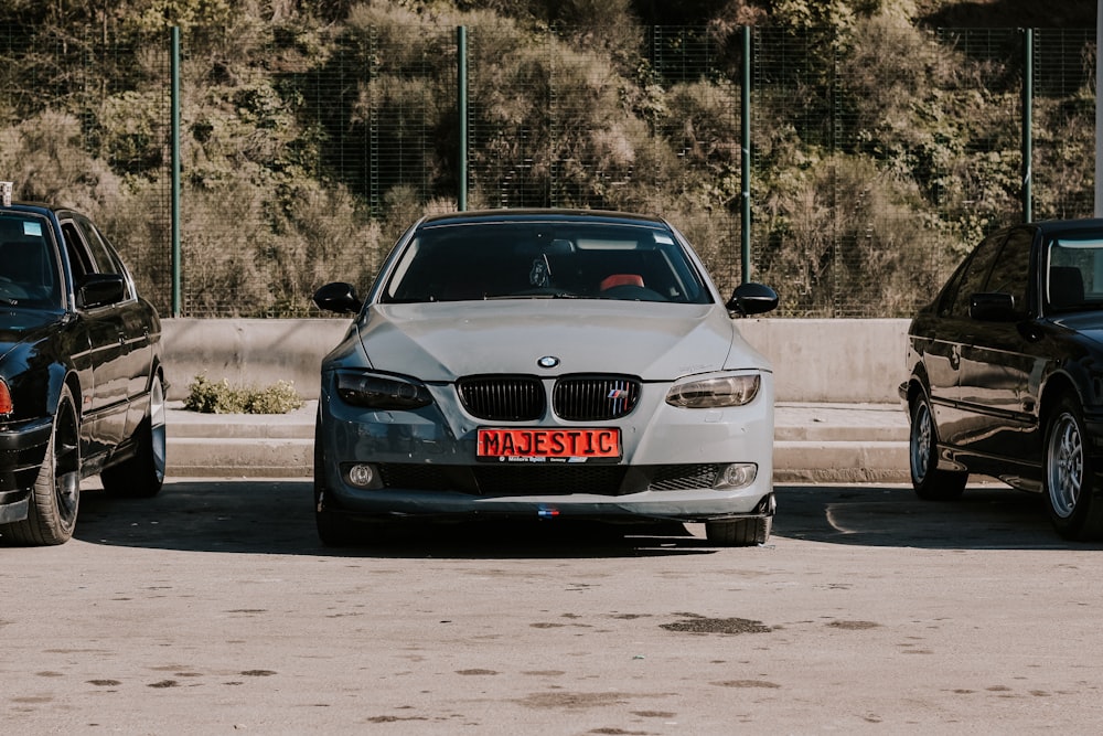 a couple of cars parked next to each other