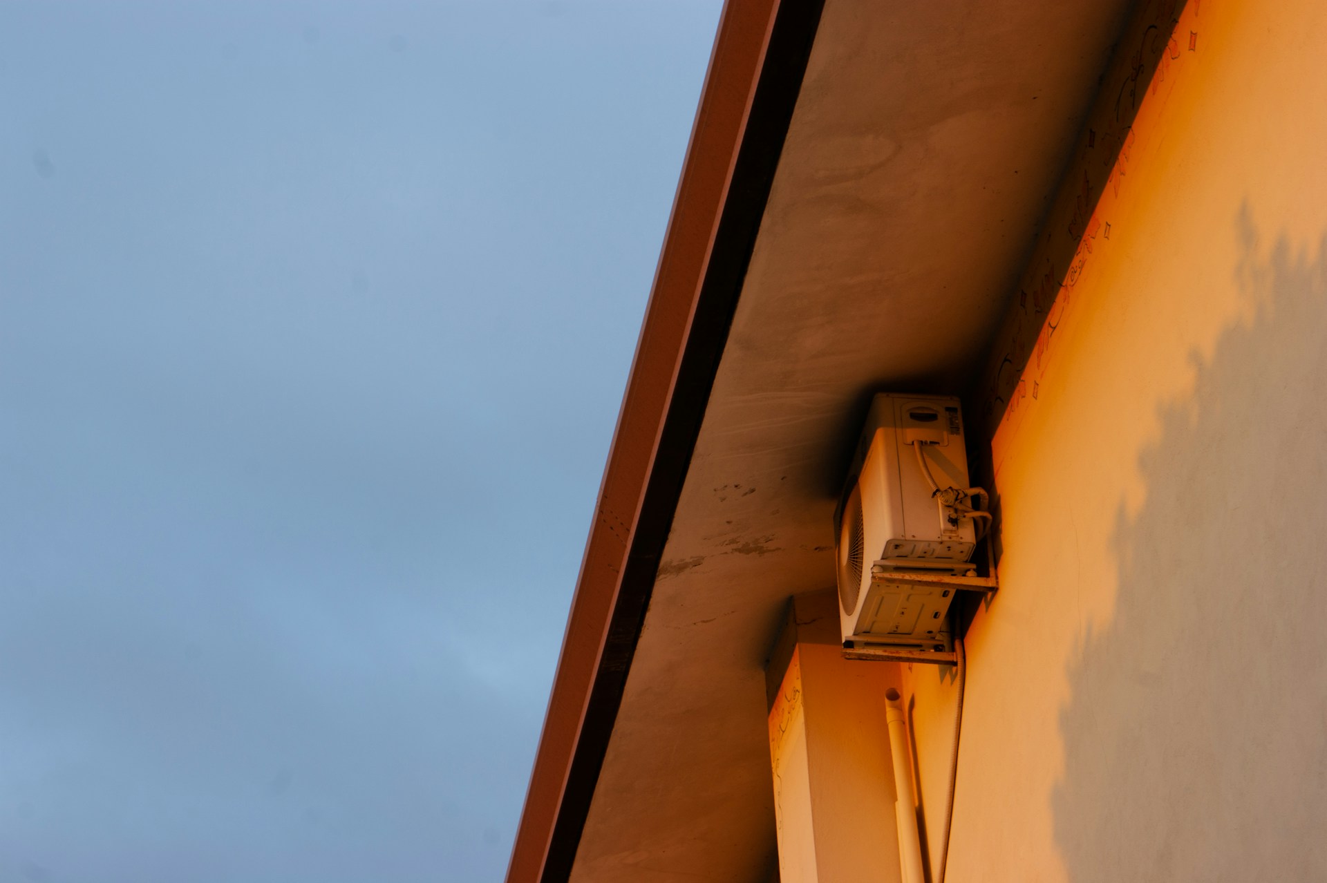 a building with a clock on the side of it