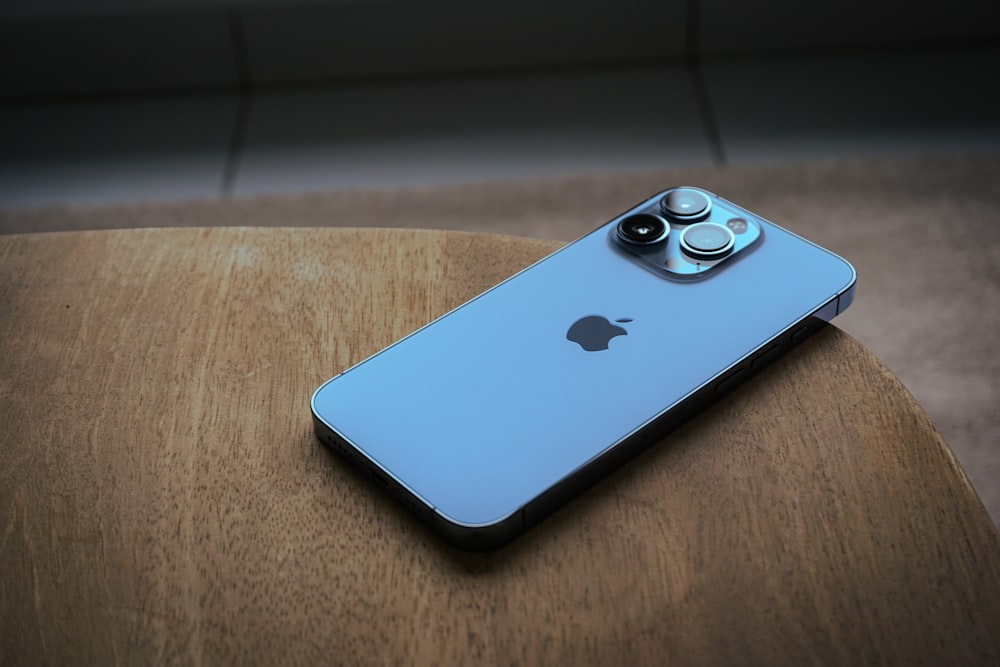 a close up of a cell phone on a table